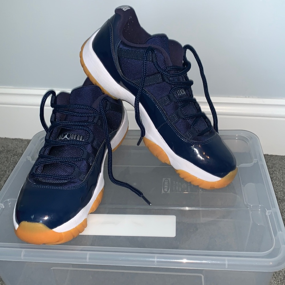 Navy blue Retro Low top Jordan 11’s.